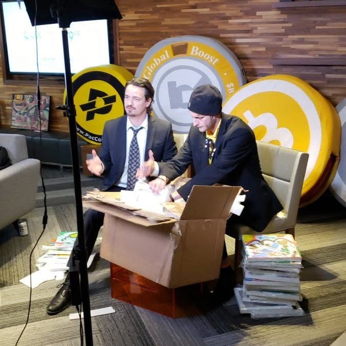 Bruce Porter Jr. and Robin Matthes talking about using crypto and art for good during Washington Elite in 2018