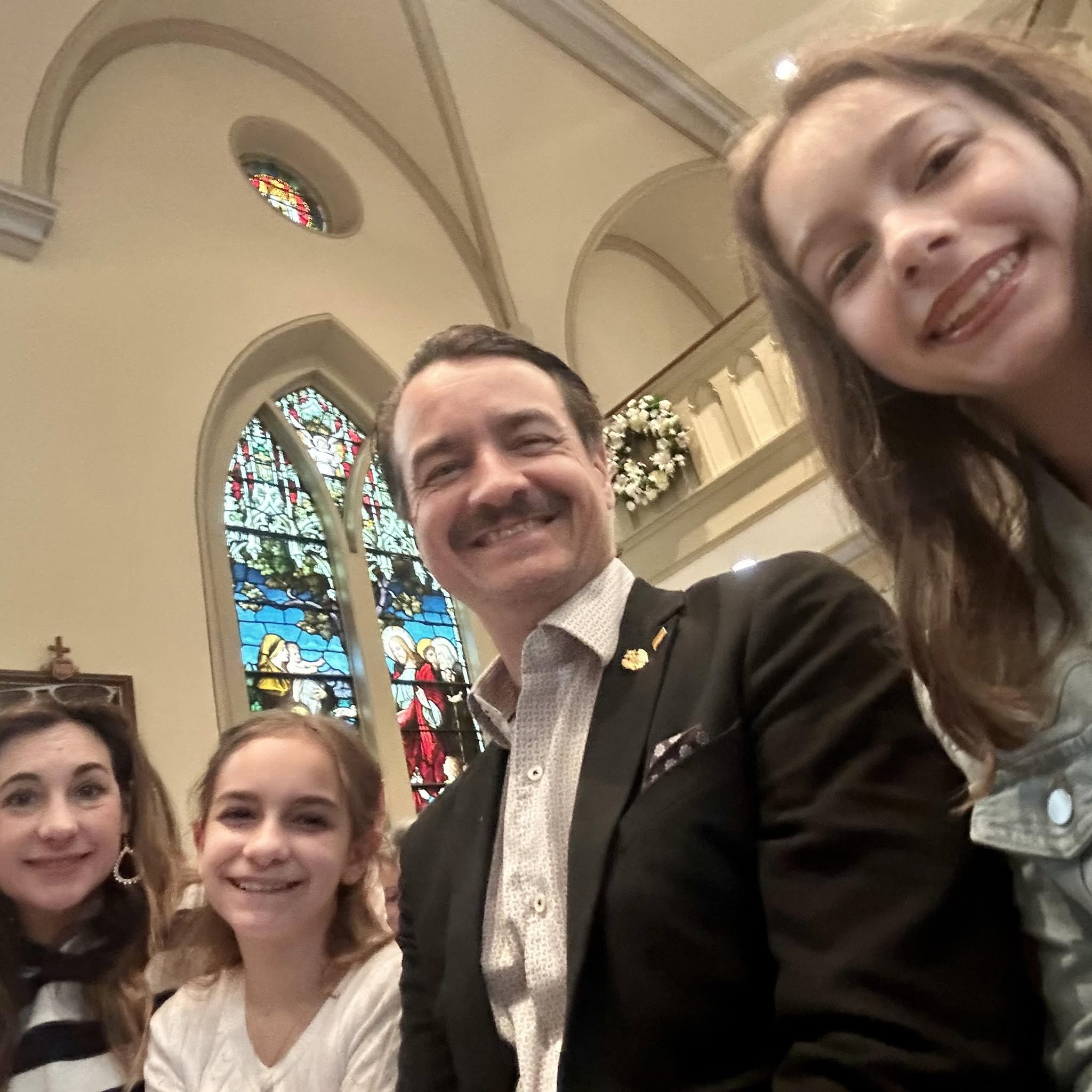 Bruce Porter Jr. with his family at church